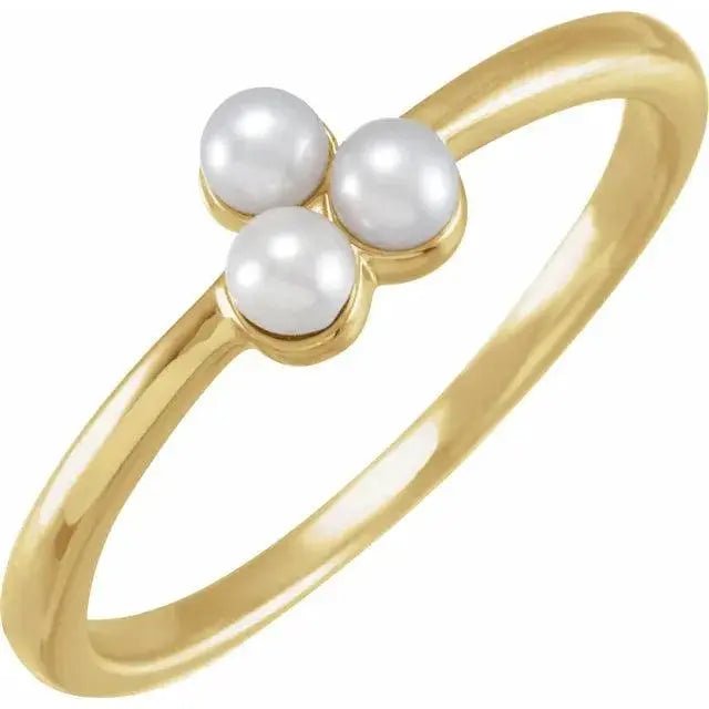 Close-up photo of 14K gold freshwater pearl cluster ring with natural pearls, handcrafted in NYC.