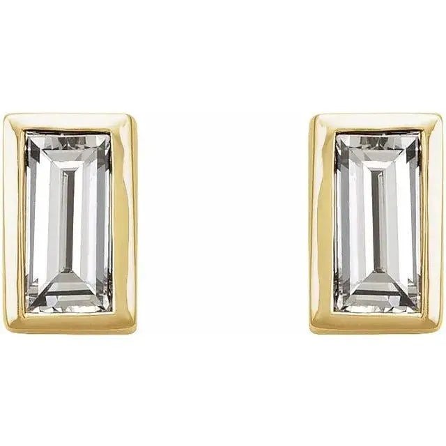 Elegant baguette-cut diamond earrings in gold bezel setting