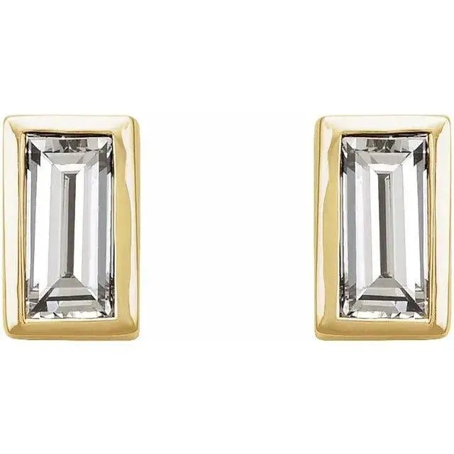 Elegant baguette-cut diamond earrings in gold bezel setting