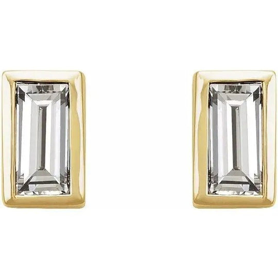 Elegant baguette-cut diamond earrings in gold bezel setting