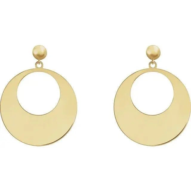 Handcrafted gold earrings featuring polished disc pendants