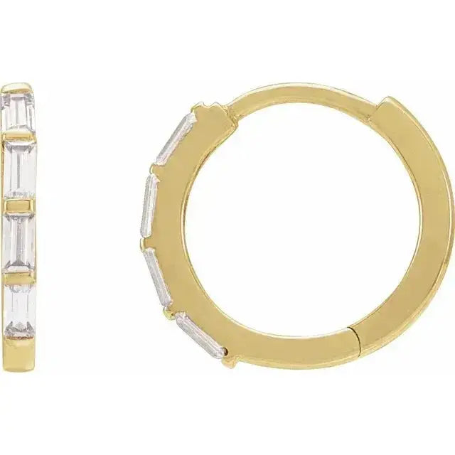 Close-up photo of 14K gold hoop earrings featuring lab-grown diamonds, handcrafted in NYC.
