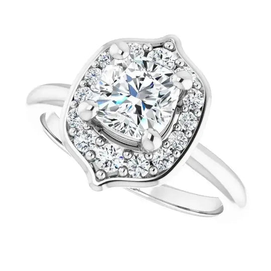 Elegant cushion diamond engagement ring with a floral halo design, set in white gold with a split shank for a sophisticated bridal look.