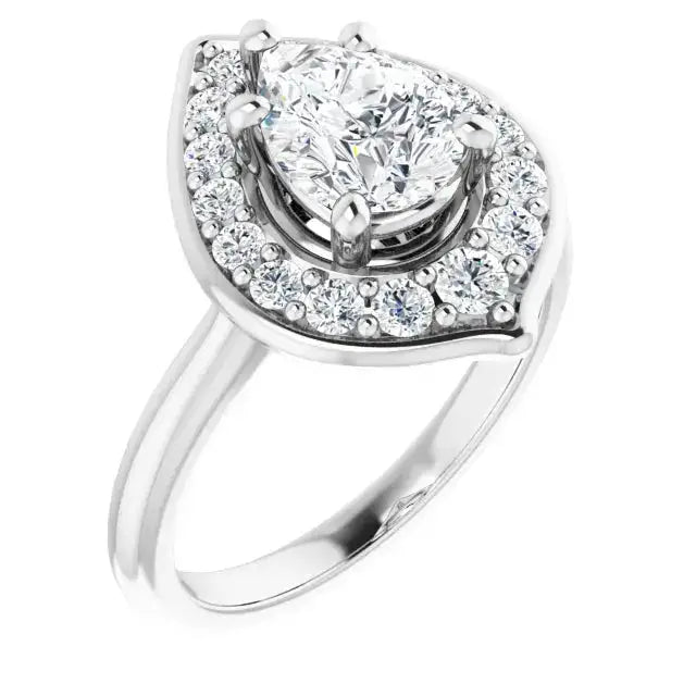 Angled view of the pear diamond flower engagement ring with a halo of round diamonds in white gold. A handcrafted symbol of love and elegance.