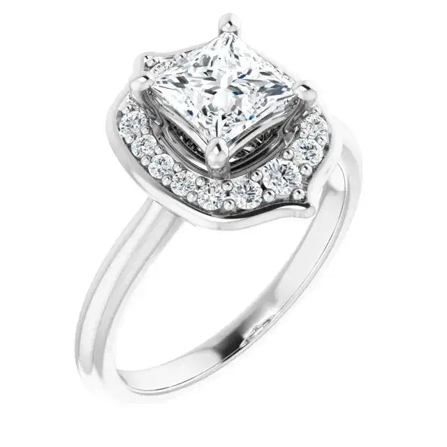 Elegant square diamond engagement ring with a floral halo design, set in a handcrafted white gold band with accent diamonds for added brilliance.