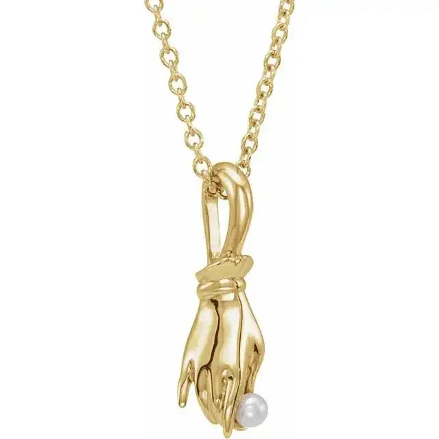 Spiritual gold necklace with Buddha hand pendant and pearl