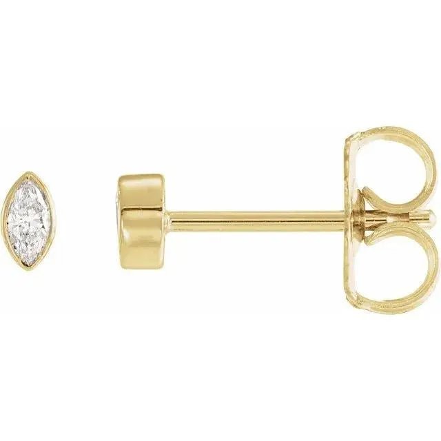 Close-up photo of 14K gold marquise diamond stud earrings with natural marquise-cut diamonds, handcrafted in NYC.