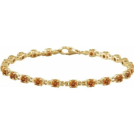 Citrine tennis bracelet in solid gold with warm golden gemstones