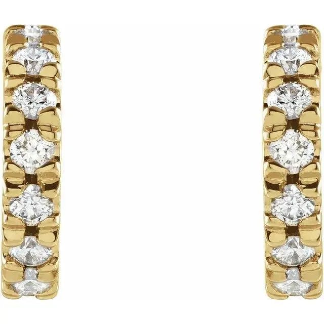 Close-up of 14K gold diamond hoop earrings with lightweight craftsmanship