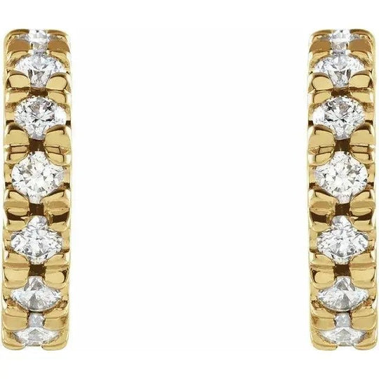 Close-up of 14K gold diamond hoop earrings with lightweight craftsmanship