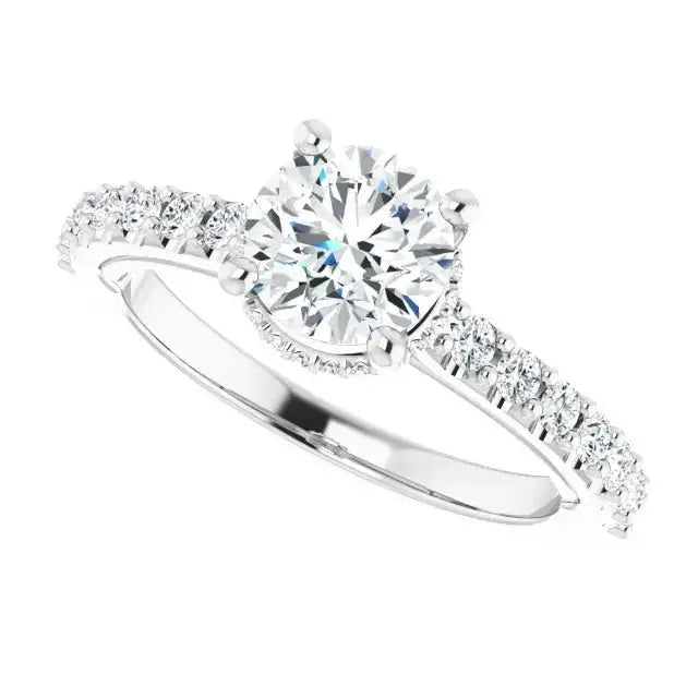 Elegant Classic Halo Round Diamond Ring featuring a round-cut diamond centerpiece, halo setting, and diamond-studded white gold band.