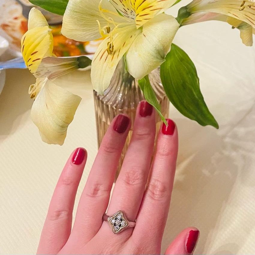 Tyche Clover ring on hand