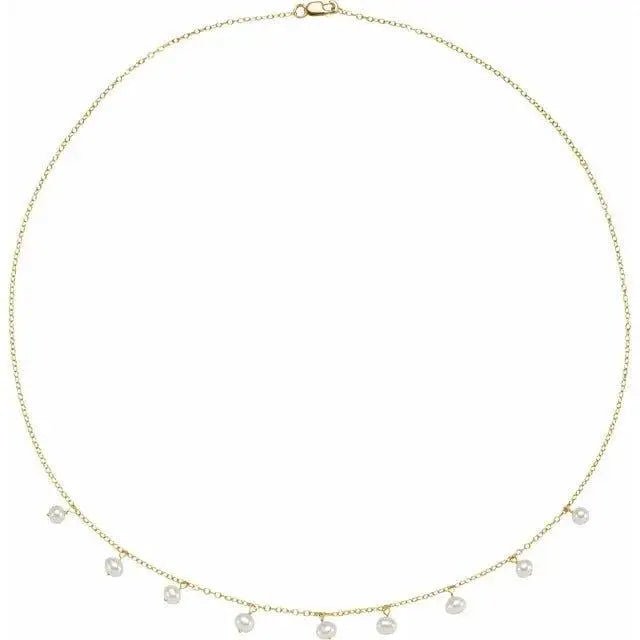 14K gold white pearl station necklace with freshwater pearls on an 18-inch chain