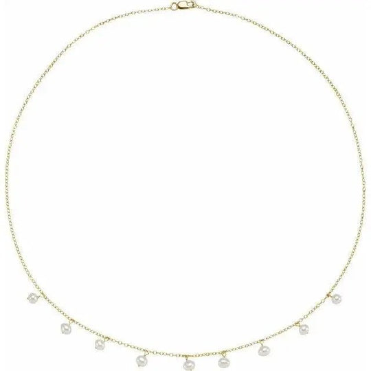 14K gold white pearl station necklace with freshwater pearls on an 18-inch chain