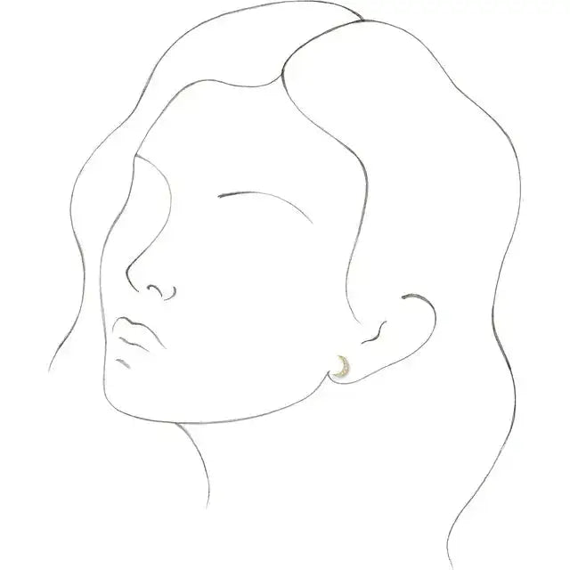 Illustration of a woman wearing diamond crescent moon earrings, showcasing their elegant fit. A celestial-inspired jewelry piece in 14K gold.