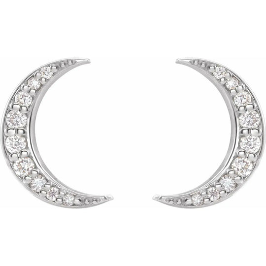 Diamond crescent moon earrings in 14K white gold, adorned with natural diamonds. A sophisticated celestial jewelry piece for elegant styling.