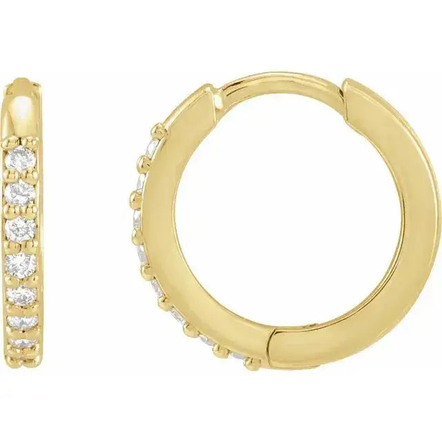 Close-up photo of 12.5mm 14K gold hoop earrings with natural diamonds, handcrafted in NYC.