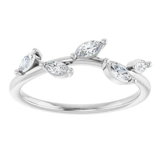 Diamond Leaf Ring paired with other fine jewelry pieces for a chic ensemble.