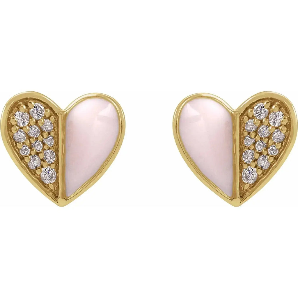 Close-up photo of diamond pink enamel heart earrings in 14K gold, handcrafted in NYC.