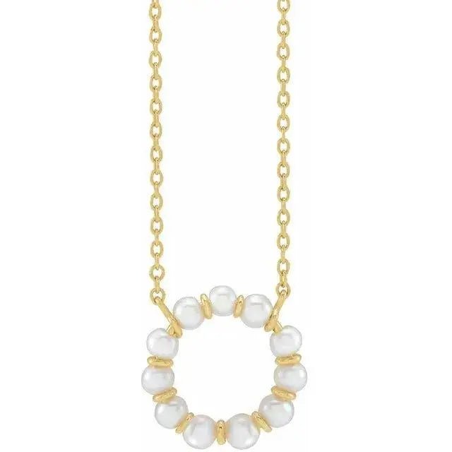 Close-up of elegant circle pendant necklace with white freshwater pearl