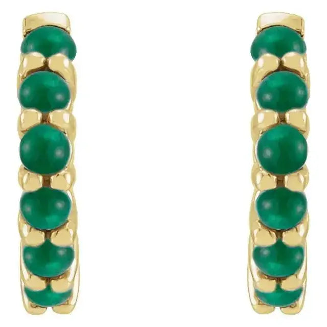 Front view of 14K yellow gold emerald cabochon hoop earrings, showcasing a row of vivid green gemstones for a refined and elegant look.