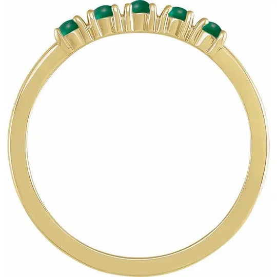 Elegant gold ring with natural emerald centerpiece