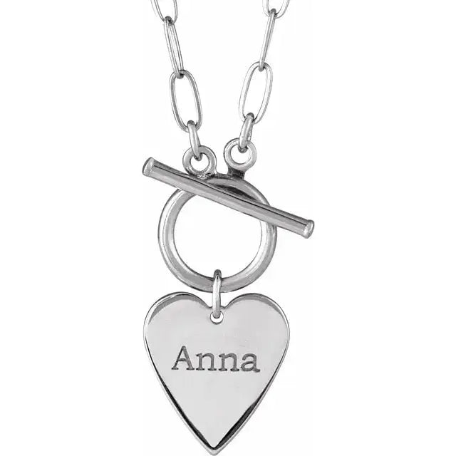 Engravable gold Heart Necklace, highlighting its polished finish and timeless appeal.