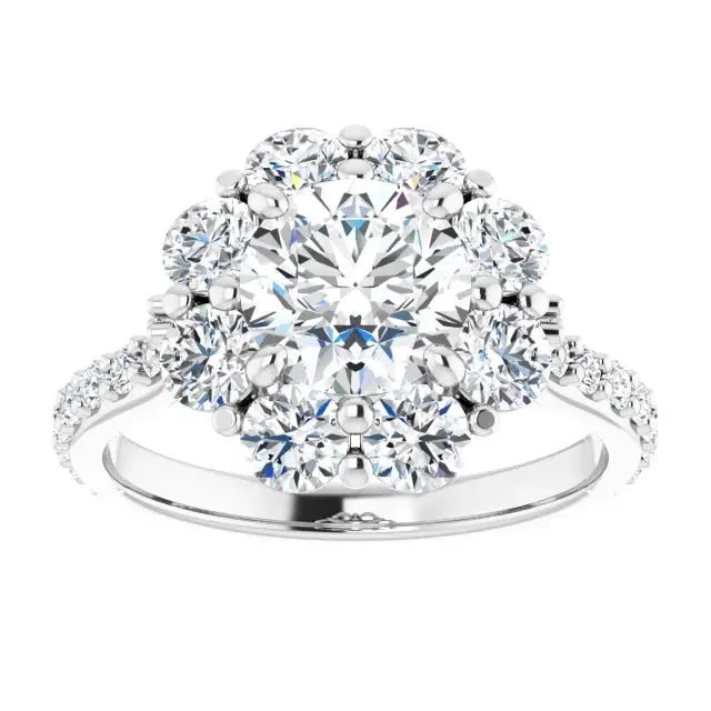 Nature-inspired diamond engagement ring with flower motif.