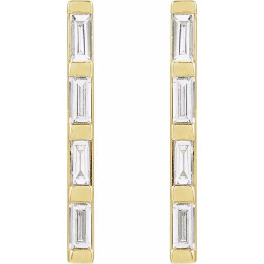 Elegant gold earrings with four natural baguette diamonds