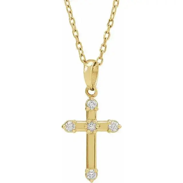Close-up photo of 14K gold diamond cross necklace with natural diamonds, handcrafted in NYC.