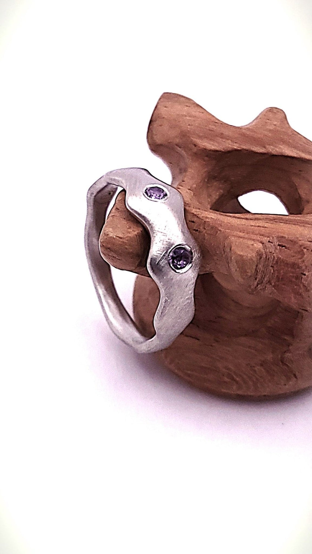 Platinum Alexandrite ring with handcrafted design – side angle.