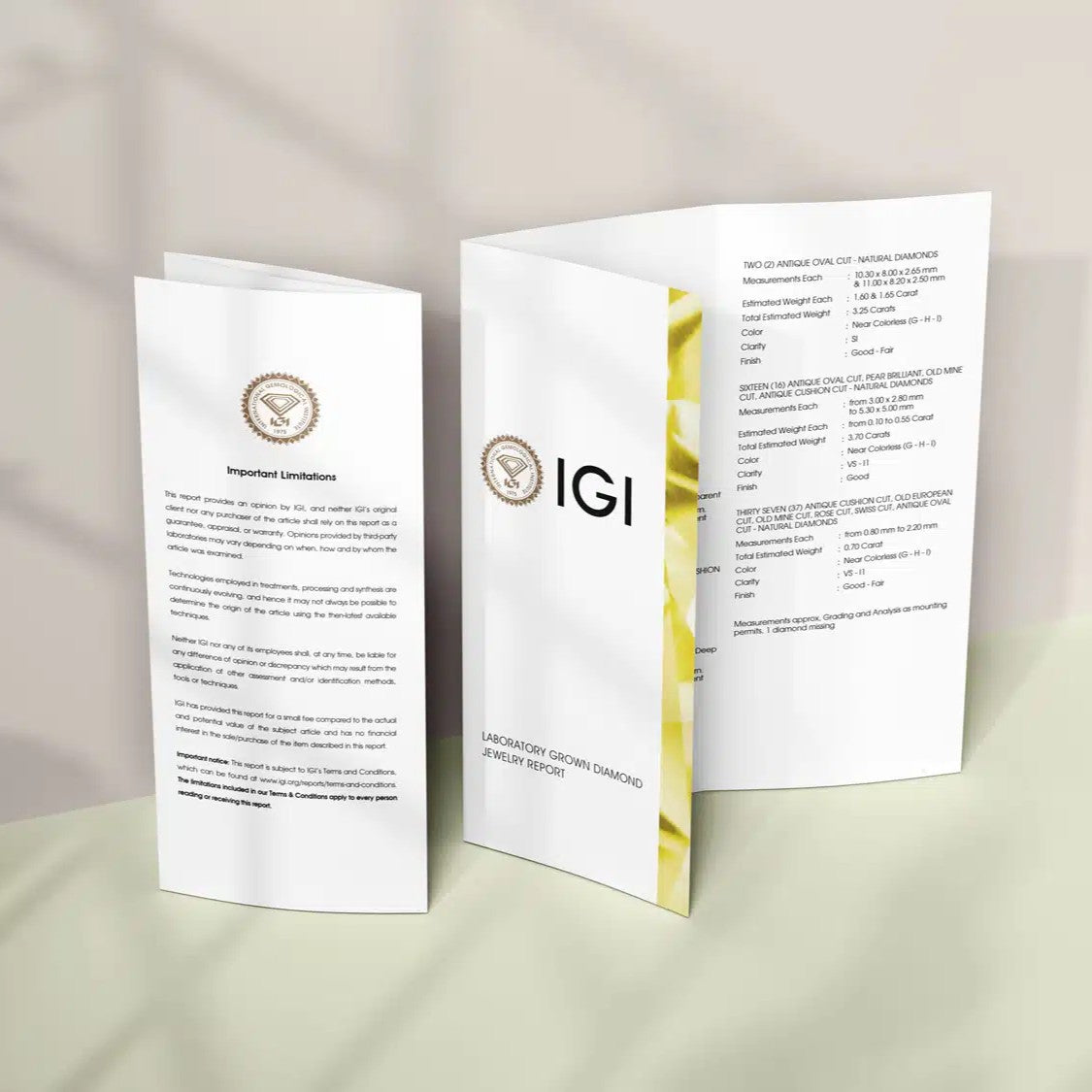 Open IGI certificate box displaying the lab-grown diamond grading report beside the ring.