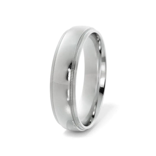 Sophisticated 14K white gold wedding band with milgrain edge – close-up.