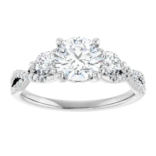 3 stone Diamond engagement ring in infinity style by Dimitrios Creations. Features a 1ct round lab-grown diamond with side stones on a white gold band.