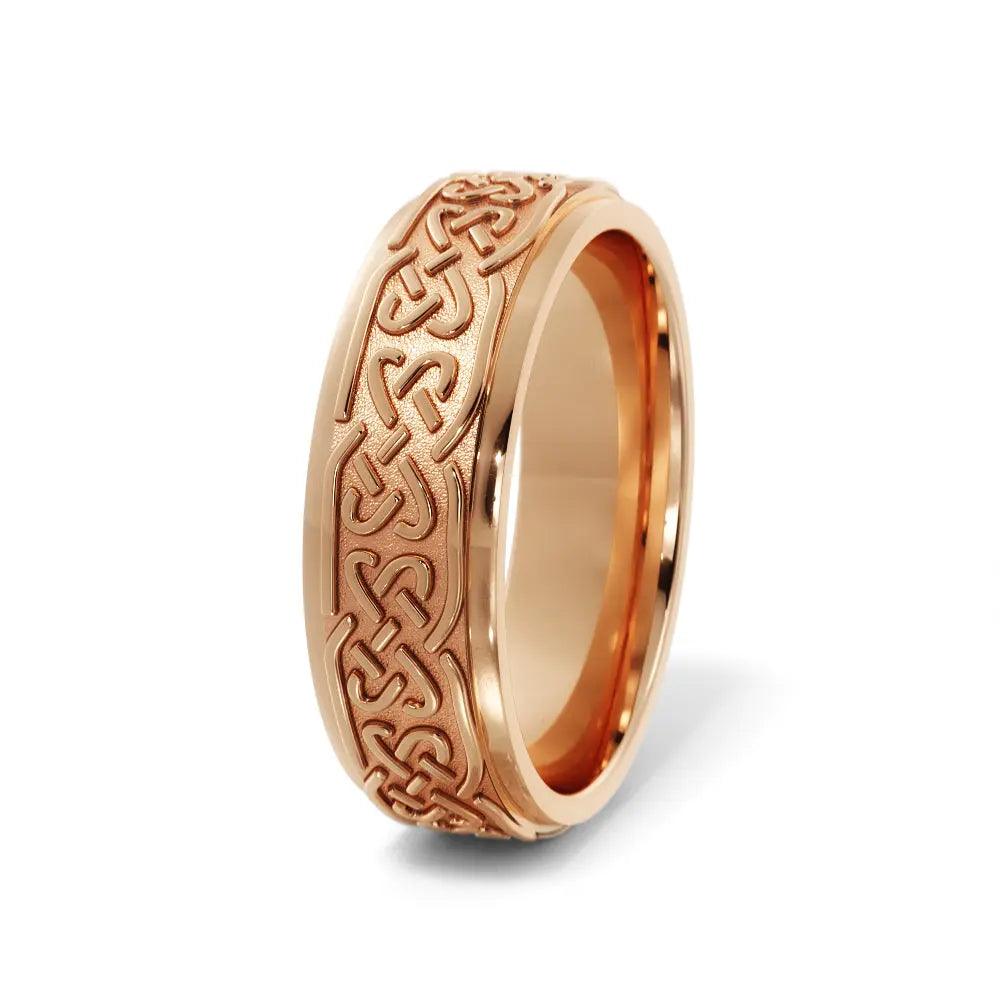 Handcrafted 6mm Celtic wedding ring in rose gold with an intricate love knot pattern. A meaningful and elegant men's wedding band.