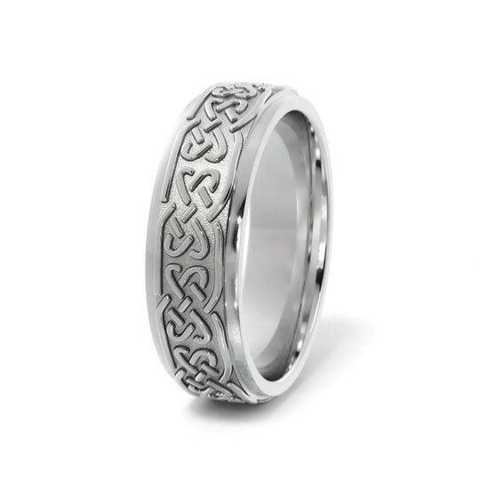 Elegant 6mm White Gold Celtic Wedding Ring with a detailed love knot pattern. A perfect unisex wedding band offering lasting brilliance and comfort fit.