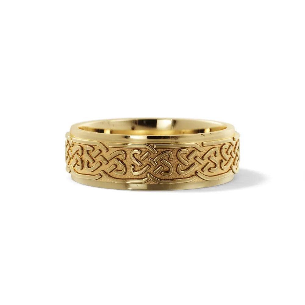 Classic 6mm Love Celtic Wedding Ring in 14K yellow gold with engraved Celtic love knot patterns. A perfect choice for a meaningful wedding band.