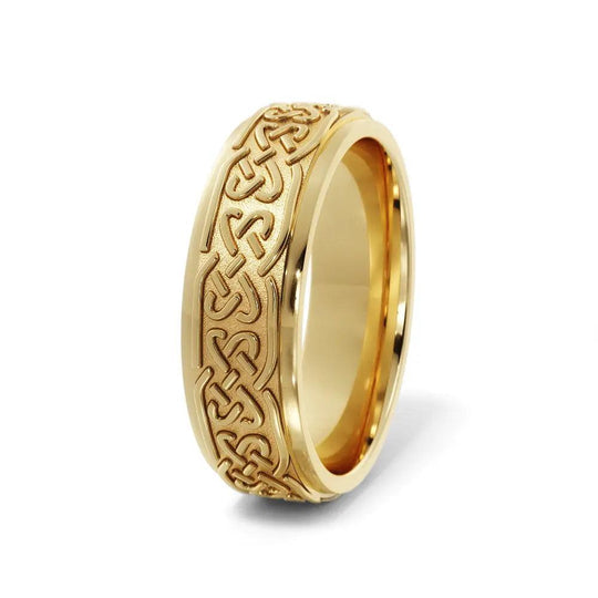 Men’s 6mm Love Celtic Wedding Ring in yellow gold featuring detailed Celtic love knots. A handcrafted, meaningful wedding band with a comfort fit.