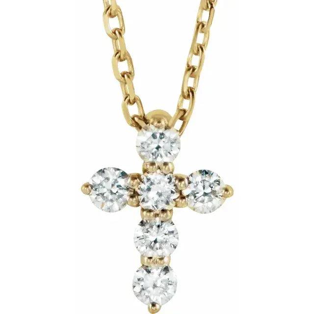 14K gold mini diamond cross necklace with six round-cut natural diamonds on an adjustable 16-18 inch chain. A delicate and elegant religious pendant.