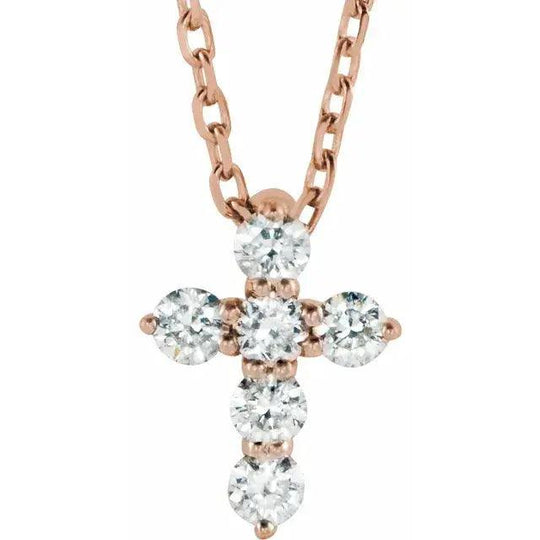 Rose gold mini diamond cross necklace with six sparkling natural diamonds on an adjustable 16-18 inch chain. A dainty and elegant religious pendant.