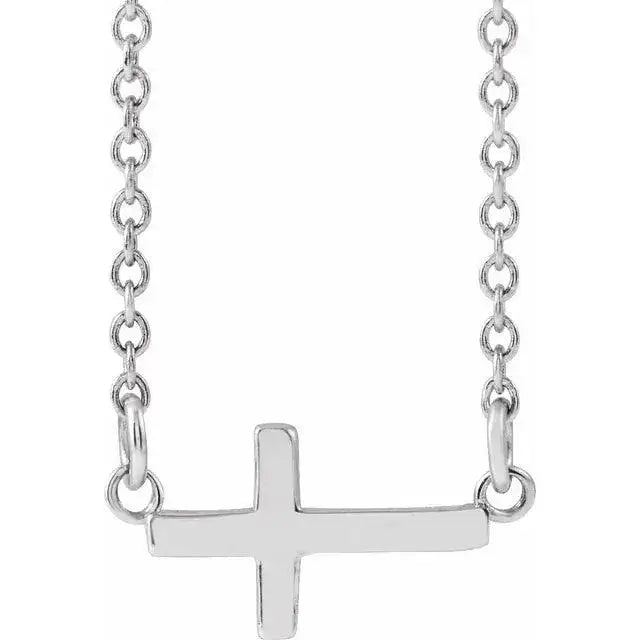 Mini Sideways Cross Necklace in 14K white gold featuring a dainty, handcrafted design. A subtle and elegant piece for timeless symbolism.