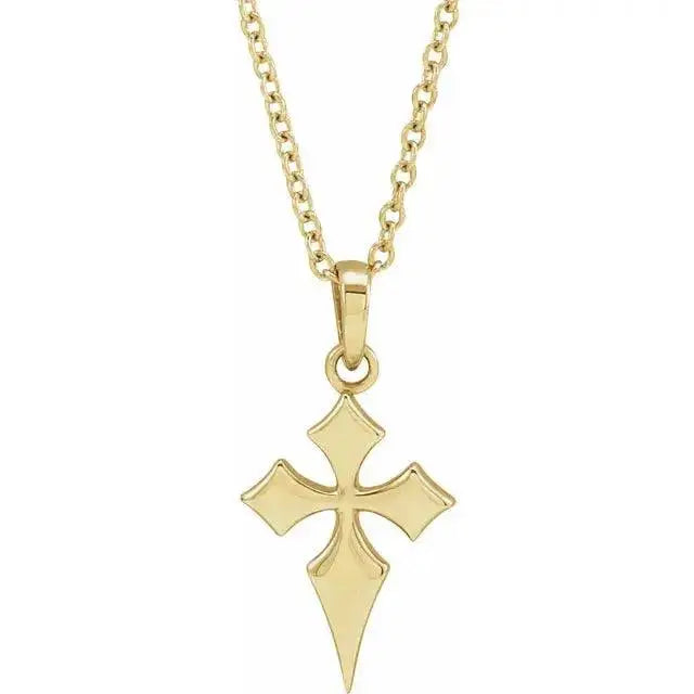Close-up photo of 14K gold modern cross necklace with minimalist design, handcrafted in NYC.
