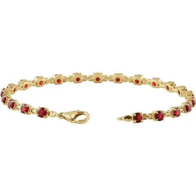 Handcrafted garnet bracelet featuring a classic tennis design