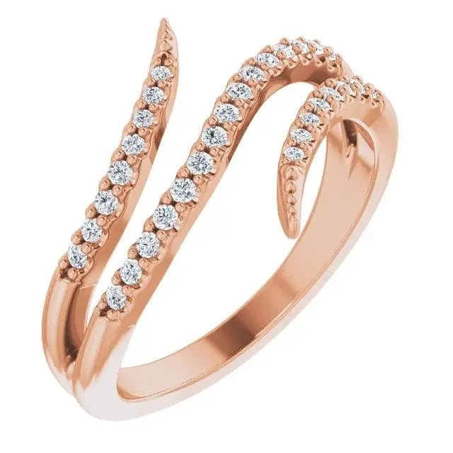 Natural Diamond Bypass Ring in 14K Rose Gold with intersecting bands encrusted with diamonds. A sophisticated and custom luxury jewelry piece.