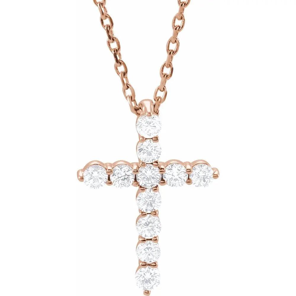 Natural Diamond Cross Necklace in rose gold featuring 1/4 carat of sparkling diamonds. A stylish and elegant religious pendant on a delicate chain.