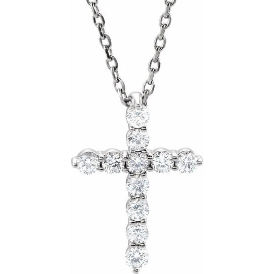 Natural Diamond Cross Necklace in white gold with 1/4 carat diamonds. A sophisticated and meaningful jewelry piece with brilliant natural diamonds.