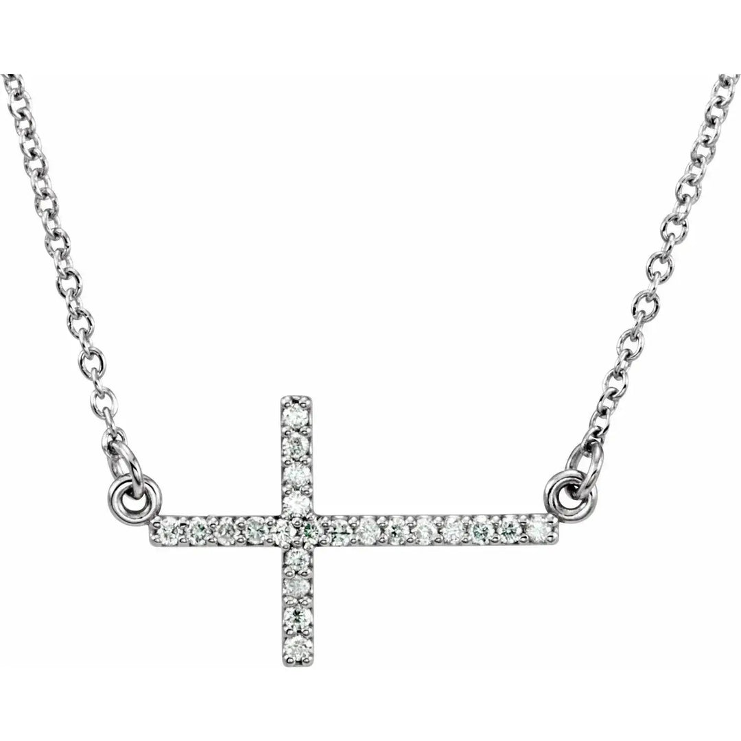 Natural Diamonds Sideways Cross Necklace in 14K white gold with a modern, elegant design. Showcases a diamond-studded cross pendant on a fine adjustable chain.