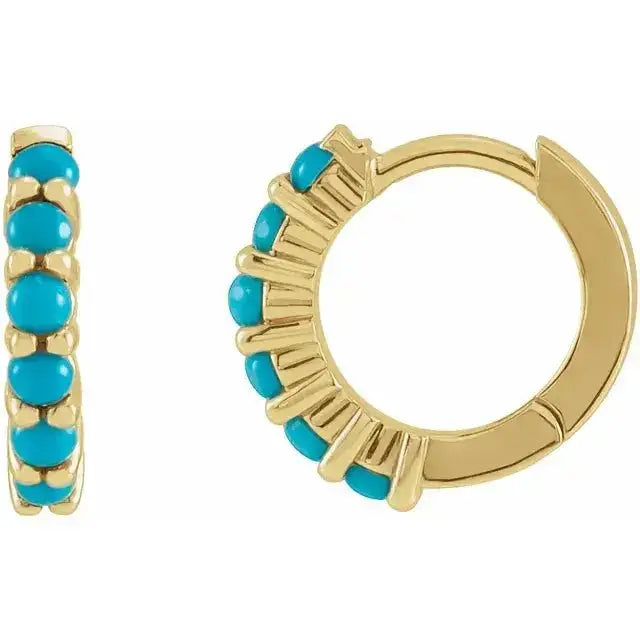 Natural turquoise huggie hoop earrings in 14K gold with vibrant turquoise stones. Sleek 12.2mm design offers bold color and timeless elegance.