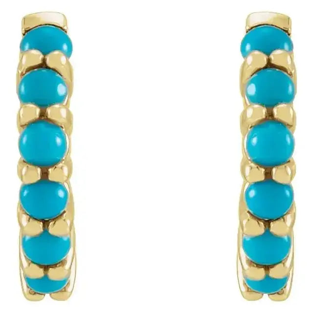 Front view of natural turquoise huggie hoop earrings in 14K gold. Features vibrant turquoise stones in a 12.2mm hoop for a stylish look.