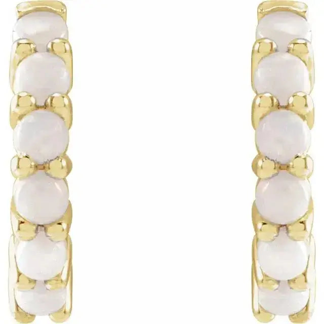 Elegant gold hoop earrings with natural white opals